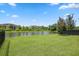 This is a view of the pond in the backyard at 9309 Tradewater Oaks Ct, Riverview, FL 33578