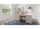 Bright office with desk, shelving, and large window at 9309 Tradewater Oaks Ct, Riverview, FL 33578