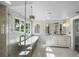 Elegant bathroom with a glass enclosed shower, tub, and double vanity at 1001 S Oregon Ave, Tampa, FL 33606