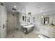 Bright bathroom featuring a glass shower, free-standing tub, and a double vanity at 1001 S Oregon Ave, Tampa, FL 33606