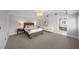 Bedroom with neutral decor, carpeted floors, and an ensuite bathroom at 1001 S Oregon Ave, Tampa, FL 33606