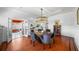 Inviting dining room with stylish chairs, hardwood floors, and open access to other rooms at 1001 S Oregon Ave, Tampa, FL 33606