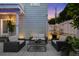The backyard patio seating area offers a relaxing space for entertaining at 1001 S Oregon Ave, Tampa, FL 33606