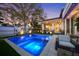 Backyard swimming pool, patio, and outdoor seating area offer a relaxing oasis at 1001 S Oregon Ave, Tampa, FL 33606