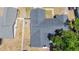 Aerial view of the house showing roof, neighboring yard, and fence at 1005 Cameo Crest Ln, Valrico, FL 33596