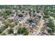 A high angle view of a charming residential community with beautiful landscaping, streets, and serene pond at 1005 Cameo Crest Ln, Valrico, FL 33596