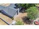 Aerial view showcasing the fenced backyard, mature trees, and screened in lanai at 1005 Cameo Crest Ln, Valrico, FL 33596