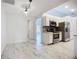 Bright kitchen featuring stainless steel appliances, modern backsplash, and an adjacent dining area at 1005 Cameo Crest Ln, Valrico, FL 33596