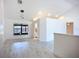 Spacious living room with an open layout leads to a modern kitchen, perfect for entertaining at 1005 Cameo Crest Ln, Valrico, FL 33596