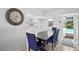 Bright dining room has a view of the outdoor pool at 10442 Cirimoya Ln, Seminole, FL 33772
