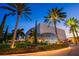 Exterior view of a modern museum with geometric glass accents and lush landscaping at 1120 N Shore Ne Dr # 201, St Petersburg, FL 33701