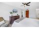 Comfortable bedroom featuring a ceiling fan, TV, and a relaxing space to unwind at 1120 N Shore Ne Dr # 201, St Petersburg, FL 33701