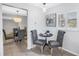 Cozy dining area with seating and natural light from the window at 1120 N Shore Ne Dr # 201, St Petersburg, FL 33701