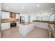 Modern kitchen featuring white cabinetry, stainless steel appliances, and granite countertops at 11625 5Th E St, Treasure Island, FL 33706