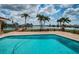 Waterfront backyard oasis with swimming pool, grass lawn, dock and boat lift at 11625 5Th E St, Treasure Island, FL 33706