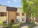Lovely two-story condo with well-maintained landscaping and mature tree offering shade at 11807 Raintree Lake Ln # B, Tampa, FL 33617