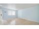 Bright, empty living room with tile floors at 11807 Raintree Lake Ln # B, Tampa, FL 33617