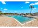 Inviting community pool with clear blue water and a brick-paved deck at 13696 Orange Sunset Dr # 13696, Tampa, FL 33618