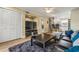 Inviting living room with ample natural light, open floor plan, and hardwood floors at 13696 Orange Sunset Dr # 13696, Tampa, FL 33618