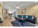 The bright living room flows into the kitchen, creating an open and inviting living space at 13696 Orange Sunset Dr # 13696, Tampa, FL 33618