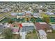 Aerial view of home with a pool, waterfront access and neighborhood at 13704 Evelane Dr, Hudson, FL 34667