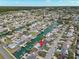 Wide aerial shot of the neighborhood featuring the home with waterfront access at 13704 Evelane Dr, Hudson, FL 34667