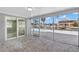 Covered patio overlooking a pool and canal, perfect for outdoor entertaining and relaxation at 13704 Evelane Dr, Hudson, FL 34667