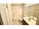 Clean bathroom featuring tiled floors, shower-tub combination, and a vanity with ample lighting at 1510 Sakonnet Ct, Brandon, FL 33511