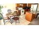 Eat-in kitchen with stainless steel appliances, stone countertops, and tile flooring at 1510 Sakonnet Ct, Brandon, FL 33511