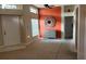 Bright living room features neutral colors, plush carpeting, and large windows providing ample natural light at 1510 Sakonnet Ct, Brandon, FL 33511
