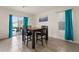 Dining area leading to a patio with an outdoor swimming pool at 15959 Tuscany Hillside Rd, Odessa, FL 33556