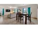 Open living space with tile floors, modern decor, and plenty of natural light at 15959 Tuscany Hillside Rd, Odessa, FL 33556