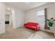 Comfortable living space with a futon and neutral decor at 15959 Tuscany Hillside Rd, Odessa, FL 33556