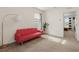 Cozy living space with a futon and view of an adjacent bedroom at 15959 Tuscany Hillside Rd, Odessa, FL 33556