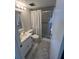 Clean bathroom with a shower, tub combination, and vanity with a sink at 18304 Gulf Blvd # 309, Redington Shores, FL 33708