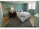 Comfortable bedroom with a large window and an antique rug on the floor at 18304 Gulf Blvd # 309, Redington Shores, FL 33708