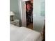 Walk-in closet with ample storage space, organized with hanging racks and shelves at 18304 Gulf Blvd # 309, Redington Shores, FL 33708