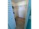 Spacious walk-in closet with ample shelving for organized storage at 18304 Gulf Blvd # 309, Redington Shores, FL 33708