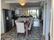 Dining area is adjacent to the kitchen with stainless steel appliances at 18304 Gulf Blvd # 309, Redington Shores, FL 33708