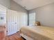 Bedroom with a closet and comfortable decor, creating a relaxing atmosphere at 19227 Garden Quilt Cir, Lutz, FL 33558
