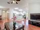 Bright interior showcasing an open layout with the living room, kitchen, and dining area flowing seamlessly together at 19227 Garden Quilt Cir, Lutz, FL 33558