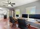 This well-lit office space includes a long work desk for multiple workstations at 19227 Garden Quilt Cir, Lutz, FL 33558