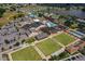 Aerial shot of community clubhouse, pool, and lawn bowling areas at 2003 Wedge Ct, Sun City Center, FL 33573