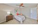 Comfortable bedroom with carpet, and a neutral palette perfect for relaxation at 2003 Wedge Ct, Sun City Center, FL 33573