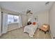 Serene bedroom with ample natural light, and a calming, neutral color scheme at 2003 Wedge Ct, Sun City Center, FL 33573