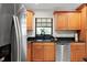 The kitchen features stainless steel appliances, granite countertops, and a view from the window at 2250 64Th N St, St Petersburg, FL 33710