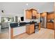 Modern kitchen with stainless steel appliances, granite countertops, and hardwood cabinets at 2250 64Th N St, St Petersburg, FL 33710