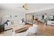 Inviting living room with an open layout, hardwood floors, and a comfortable seating arrangement at 2250 64Th N St, St Petersburg, FL 33710