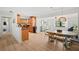 Open-concept living space featuring a modern kitchen, dining area, and a comfortable living room setup at 2250 64Th N St, St Petersburg, FL 33710