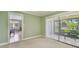 Cozy room offers access to both the dining area and lanai with lovely outdoor views at 2537 Oakleaf Ln # 32A, Clearwater, FL 33763